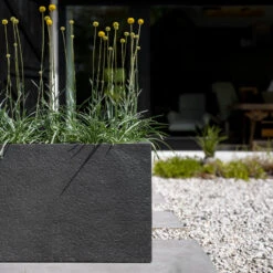 Jort Granite Trough Planter - Midnight Black 6 Jort Granite Trough Planter - Midnight Black -PlantVibe Shop Jort Granite Trough Planter Midnight Black Lifestyle